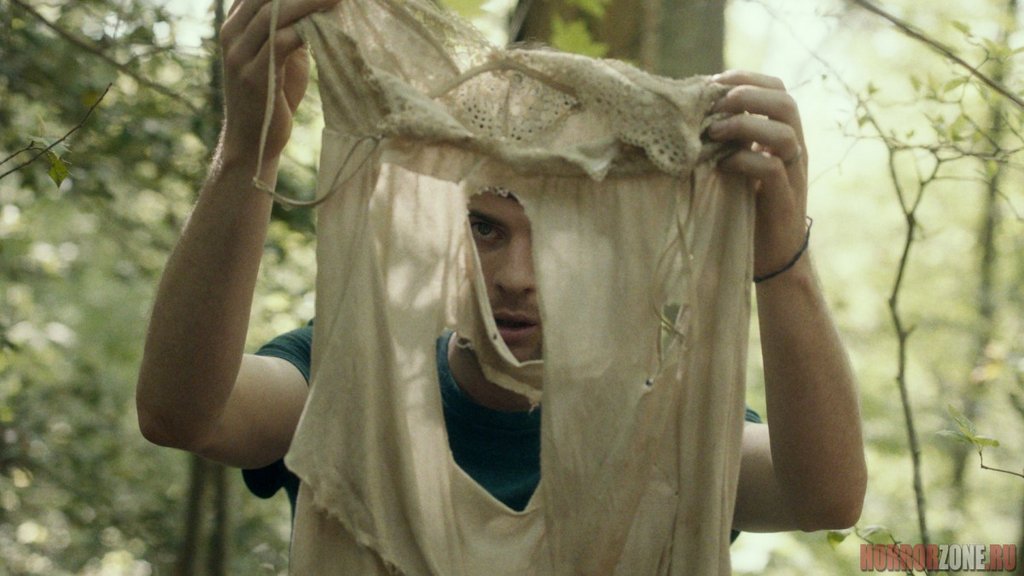 Honeymoon's Harry Treadaway finds some disturbing evidence in the woods. 