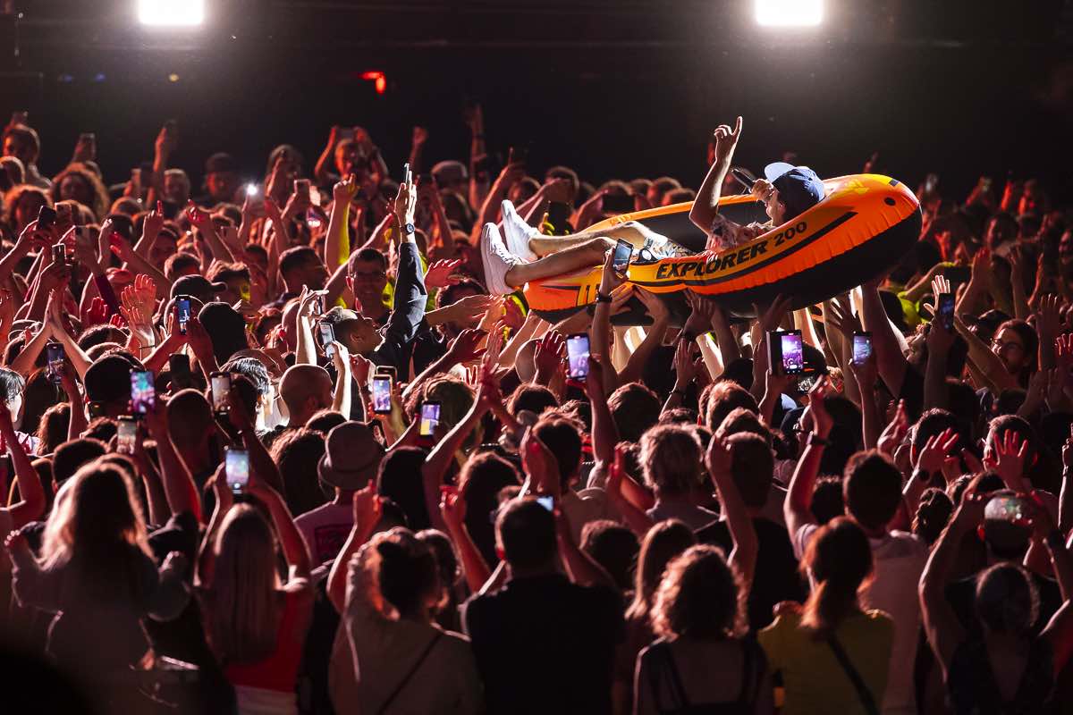 Clay and Friends frontman Mike Clay takes a ride during their set at the Montreal International Jazz Festival. Photo: Eva Blue.